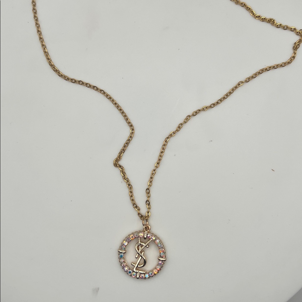 868. Elegant Gold YSL Pendant on 18” gold plated chain. - Picture 8 of 8